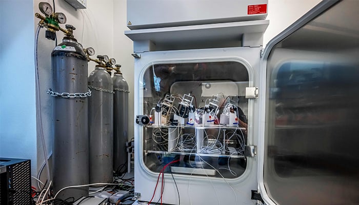 Devices containing human brain cells are photographed inside a laboratory refrigerator at the Swiss start-up FinalSpark in Vevey, on October 3, 2025. — AFP